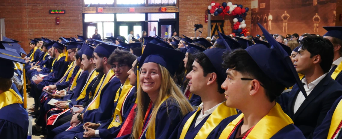 spring 2025 cs graduates seated at the ceremony