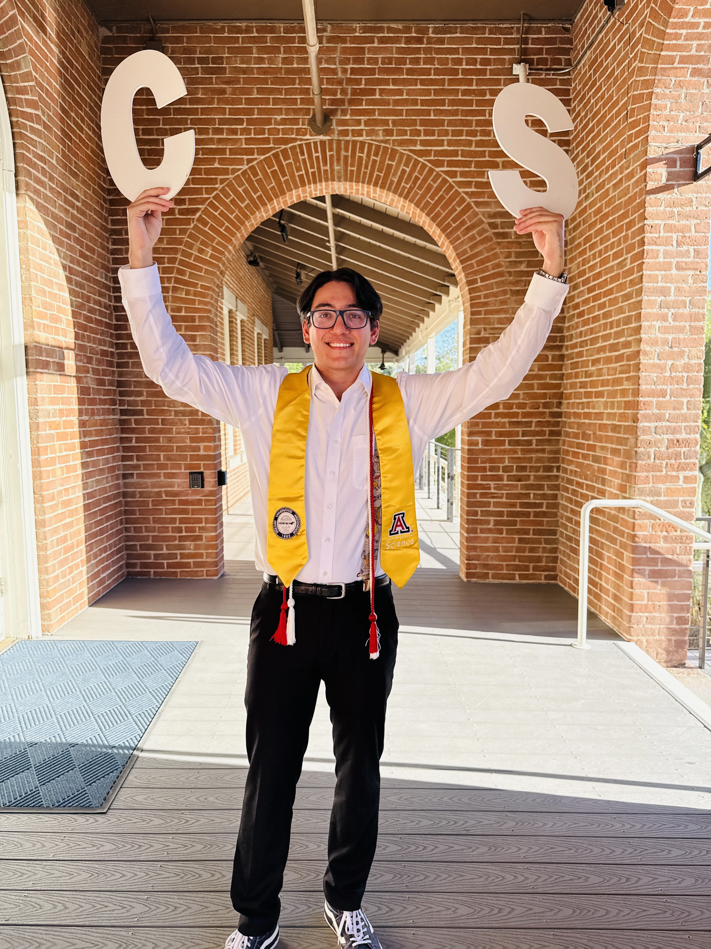 spring 25 grad holding cs letters